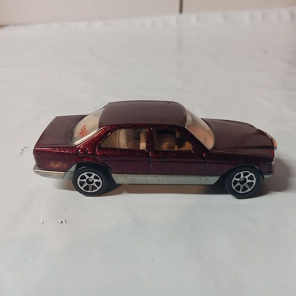 RADIANT '91 MERCEDES BENZ METALLIC RED COLOR SCHEME 3" LONG HW LOOSE FRONT WHEEL